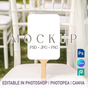 May include: A white rectangular sign with a wooden handle, labeled "MOCKUP" and "PSD + JPG + PNG." The sign is propped on a white chair, with text at the bottom indicating it's editable in Photoshop, Photopea, and Canva.