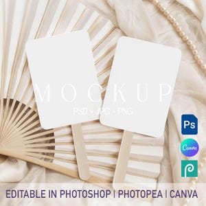 May include: Two white rectangular mockups with wooden handles are displayed against a backdrop of a beige fan and fabric. The word "MOCKUP" is visible on the mockups. The text "EDITABLE IN PHOTOSHOP | PHOTOPEA | CANVA" is at the bottom.