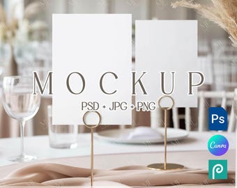 May include: A mockup image featuring two blank white cards held by gold metal stands. The word "MOCKUP" is displayed in a brown font. Text on the image includes "PSD + JPG + PNG" and "EDITABLE IN PHOTOSHOP | PHOTOPEA | CANVA".