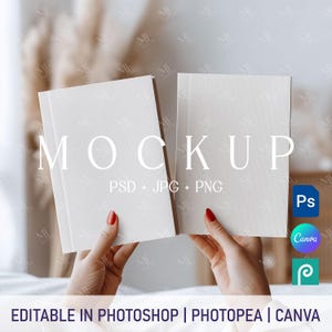 May include: Two blank white book covers held open by hands with red nail polish. The text "MOCKUP" is written in white on the covers, with the text "PSD + JPG + PNG" below it. The image is suitable for use as a mockup for book covers.