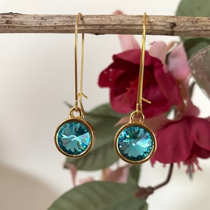 Boucles doreilles Swarovski Long Dangling. Deux finitions, plusieurs couleurs Gold/Turquoise