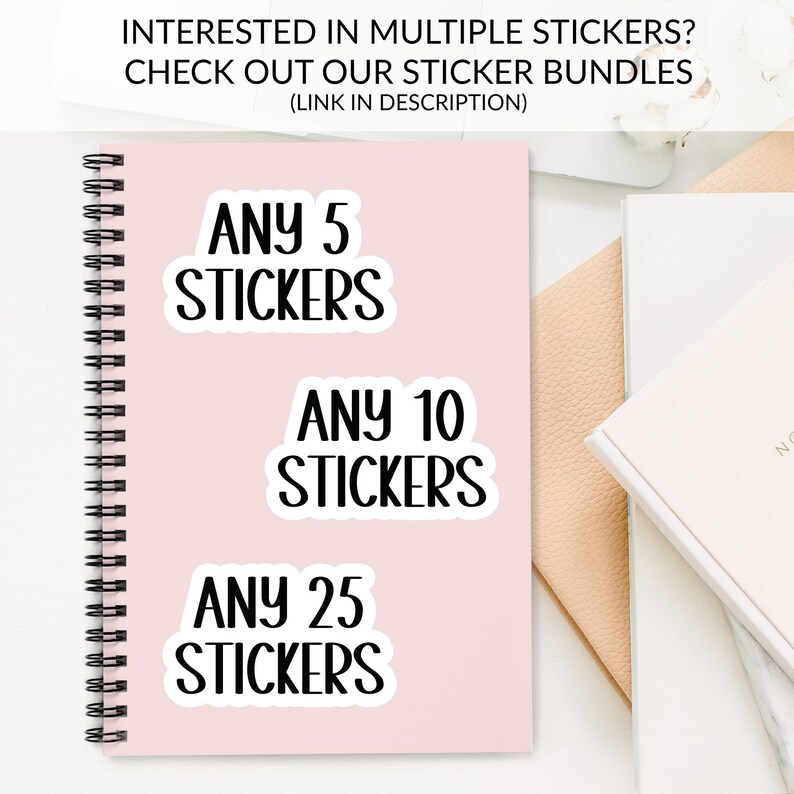 The image is an advertisement for a sticker bundle, featuring a pink notebook with the text "ANY 5 STICKERS ANY 10 STICKERS ANY 25 STICKERS" and a white notebook with the text "ANY 5 STICKERS ANY 10 STICKERS ANY 25 STICKERS".