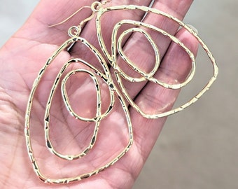 Large gold hoop earrings. 14k gold filled & plated asymmetric hammered loops. 60mm x 40mm, lightweight statement earrings. Gift for her