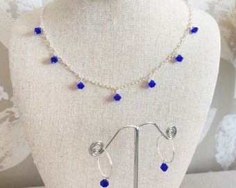 Cobalt blue crystal charm necklace with sterling silver chain. Delicate layering chain with deep royal blue czech glass crystals. HoC Su, Wi