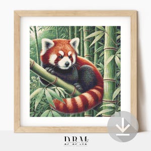 以下が含まれることがあります： 竹の枝に止まっているレッサーパンダが描かれた額入りのプリント。レッサーパンダは、赤茶色の毛皮と白い模様、縞模様の尾を持っています。背景には緑色の竹の茎と葉が描かれています。フレームはライトブラウンです。