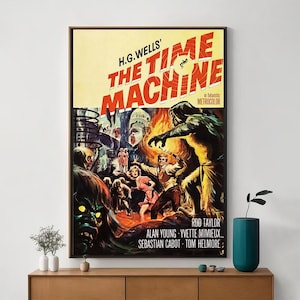 May include: A vintage movie poster for the film "The Time Machine" featuring a large, menacing creature with a red background. The poster includes the film's title, the director's name, and the actors' names.
