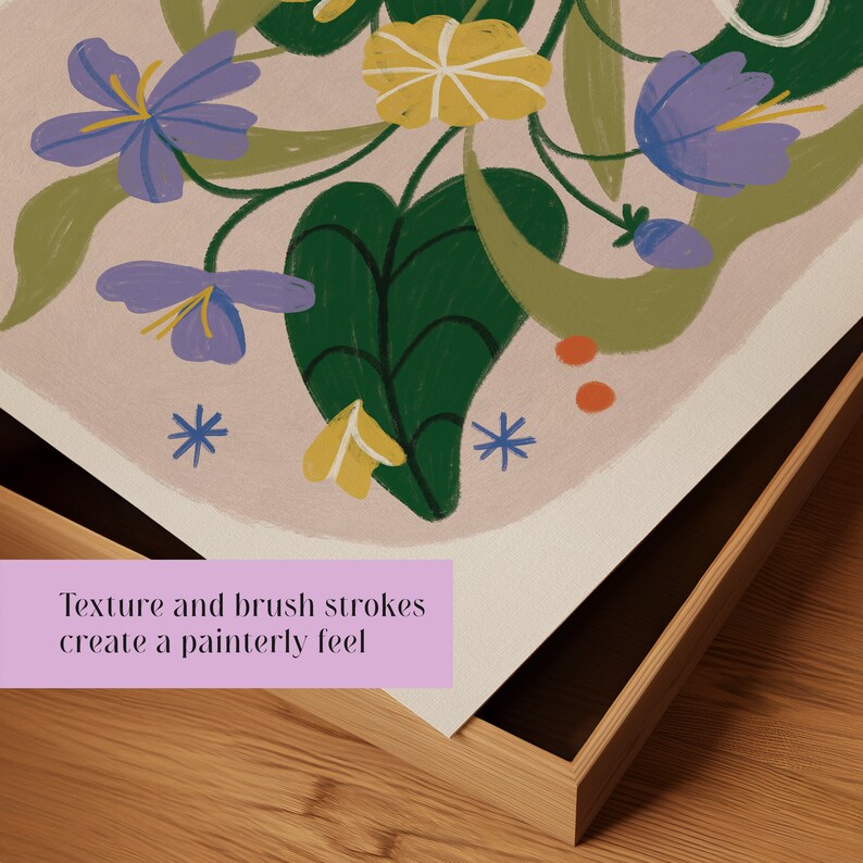 May include: A framed print with a floral design featuring purple, yellow, and green flowers on a light pink background. The print has a painterly feel with visible brushstrokes.