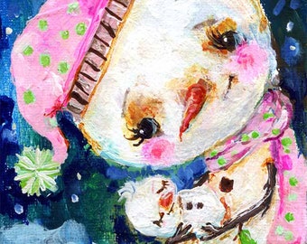 May include: A whimsical snowman with a pink and green hat and scarf, holding a smaller snowman. The background is a blue night sky with white stars.