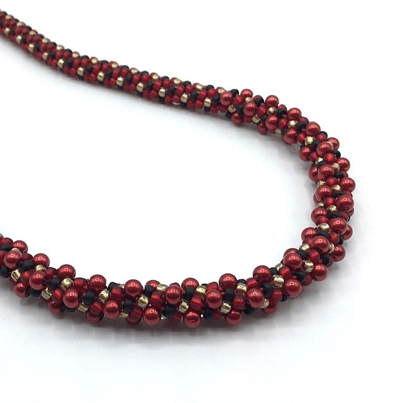 Red, black & gold w/ red crystal pearls Kumihimo Necklace image 1