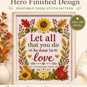 Puede incluir: Un patrón de punto de cruz imprimible titulado Hero Finished Design con el texto Let all that you do be done in love y 1 Corinthians 16:14. El diseño está enmarcado por hojas de otoño, girasoles, trigo y bayas, midiendo 236 x 295 puntos.