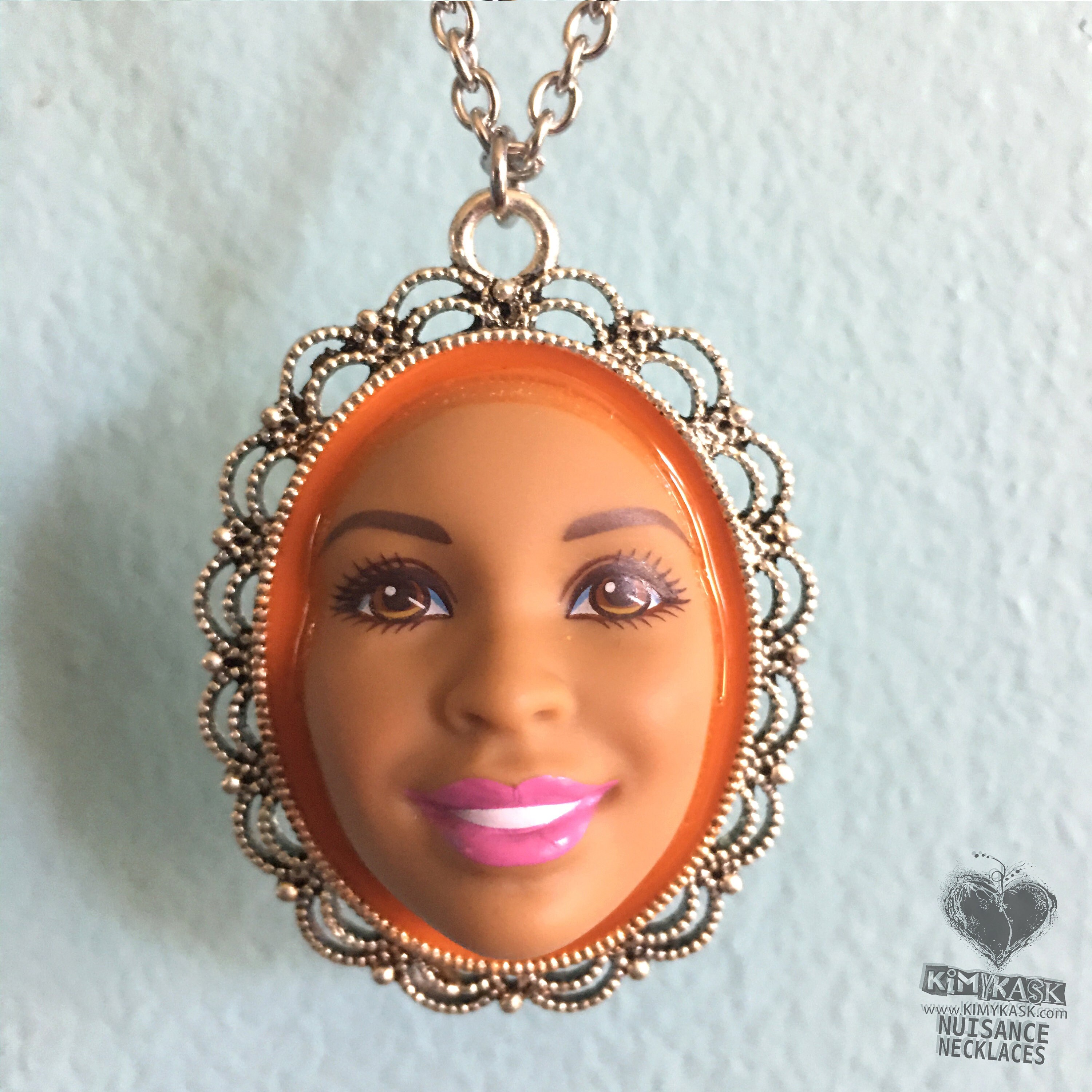 Barbie head necklace online