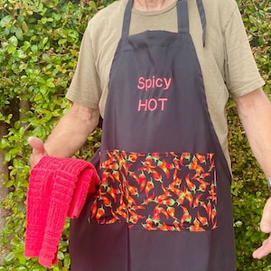 Spicy hot, Men&#39;s apron  bar-b-Que apron, it has a towel on the  side, adjustable neck strap, chili peppers