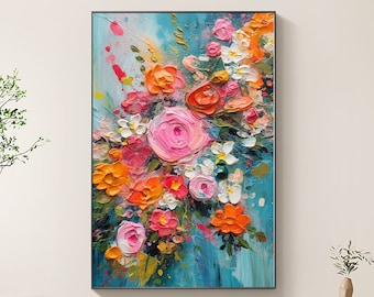 Può includere: Dipinto floreale astratto incorniciato. Presenta un bouquet di fiori strutturati nei toni del rosa, arancione e bianco su uno sfondo turchese. Il dipinto, con una cornice nera, aggiunge un tocco vibrante a qualsiasi spazio.
