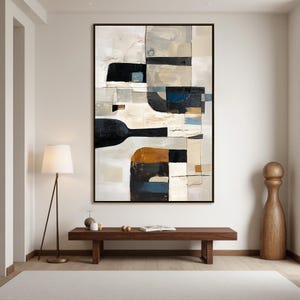 May include: Abstract art print featuring a black wine bottle shape and geometric shapes in neutral tones of beige, gray, and black. The artwork is framed in a black border and hangs above a wooden bench.
