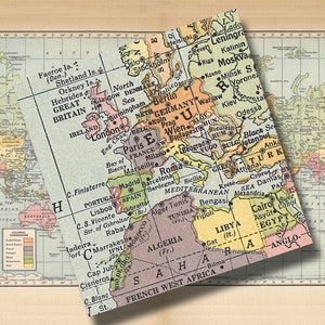 May include: A vintage world map with a focus on Europe, the Middle East, and Africa. The map is printed on paper with a light brown background and features a variety of colors to represent different countries and regions. The map includes text labels for major cities, countries, and geographical features.