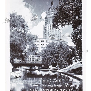 May include: A black and white vintage postcard depicting the Transit Tower in San Antonio, Texas. The tower is viewed from across the San Antonio River, with a bridge in the foreground.