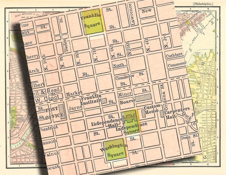 May include: A vintage map of Philadelphia, Pennsylvania, showing the streets and landmarks of the city's historic center. The map highlights key locations like Franklin Square, Independence Hall, and Independence Square. The map is printed in shades of pink, green, and yellow.