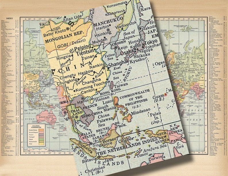 May include: A vintage map of Asia with a focus on China, Southeast Asia, and the Philippines. The map is printed on a light blue background with brown and yellow borders. The map includes country names, major cities, and geographic features.