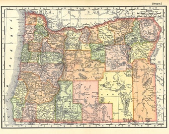 May include: A vintage map of Oregon, USA, showing county boundaries and major rivers. The map is printed in shades of yellow, green, and pink, with a key in the top right corner. The map is titled "Oregon" and includes the text "Scale: Statute Miles, 1 Inch = 24 Miles."