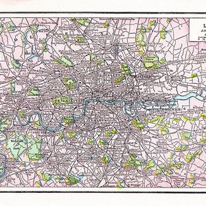 May include: A vintage map of London and its surrounding area, printed in black and white with colored accents. The map shows the Thames River winding through the city, with parks and other landmarks marked in green. The title "Map of London and Vicinity" is printed at the top, along with the scale in miles.