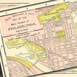 May include: An antique map of Philadelphia, Pennsylvania, showing the main portion of the city. The map is printed in black, red, and yellow ink on a white background. The map includes street names, landmarks, and a scale of miles and meters.