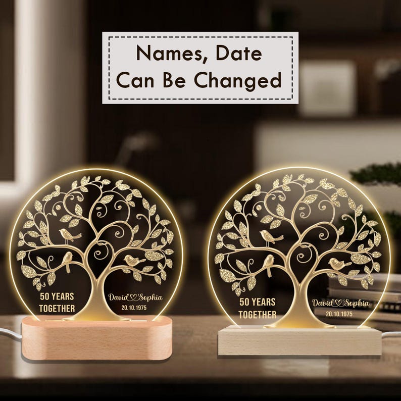 Romantic 50-year anniversary LED lamp with engraved couple’s names, wedding date, and glowing acrylic tree design with birds and hearts.