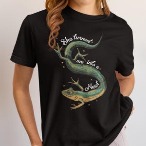 She Turned Me Into A Newt T-shirt Unisex Short Sleeve Tee Mens Womens Shirt with Funny Newt Design Graphic Tees