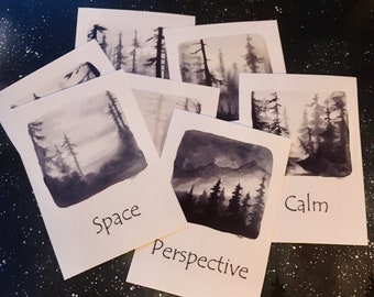 May include: Six black and white watercolour paintings of forest scenes with the words "Space", "Perspective", "Calm" written on the cards.