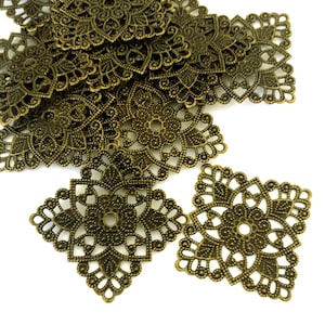 Liquidación: 6 parches de latón con filigrana de diamante y acabado bronce antiguo.
