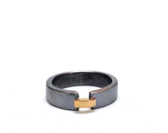 18k gold bridge ring in oxidized sterling silver