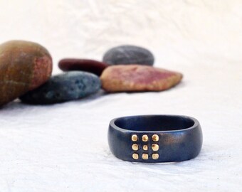 the nove band -- 7mm wide finger shaped band in oxidized silver and 18k yellow gold