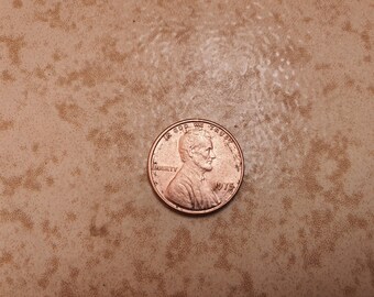 1975: Lincoln Penny