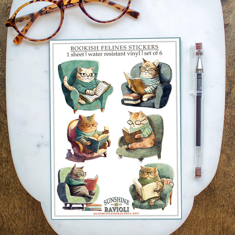 May include: Six colorful stickers featuring cats reading books in armchairs. The stickers are water resistant and come on a single sheet. The text on the sheet reads "Bookish Felines Stickers", "1 sheet | water resistant vinyl | set of 6", "Sunshine Ravioli", and "sunshineandravioli.net".