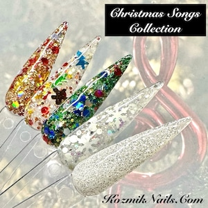 May include: Five different nail polishes with glitter and various Christmas-themed designs. The polishes are arranged in a row on a white surface. The text "Christmas Songs Collection" is at the top of the image. The text "Kozmik Nails.Com" is at the bottom of the image.