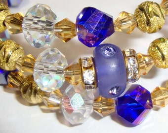 Triple bangle bracelet in blues, purple,golden topaz, clear Swarovski crystal- adjustable stack memory wire - SALE - Ready to ship/mail now.