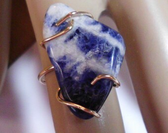 Raw Sodalite set in Gold filled claws.  Size 6  READY To Mail - 15x25mm Only one like it ever. Minimal simple brutalist Blue n white