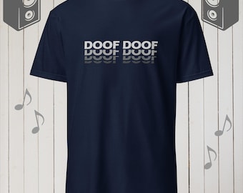 May include: A navy blue t-shirt with the text "DOOF DOOF" printed in white on the front. The text is repeated three times, with each repetition slightly smaller and lighter than the one above it.