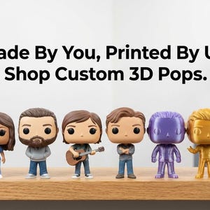 May include: A collection of custom 3D-printed Pop figures in various colors and designs, standing on a wooden surface. The figures are lined up in a row, with the text "Made By You, Printed By Us. Shop Custom 3D Pops."