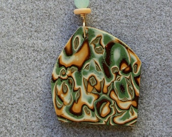 Dramatic polymer clay pendant necklace in an organic green, gold and copper design