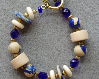 Cobalt and Cream chunky bracelet with polymer clay, wood, fire-polished Czech glass and pewter