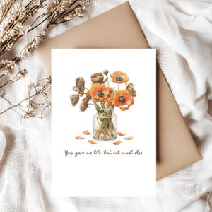 May include: Greeting card with a watercolour illustration of orange poppies in a glass vase. The card includes the text "You gave me life, but not much else" in a handwritten style font. The card is on a white background.