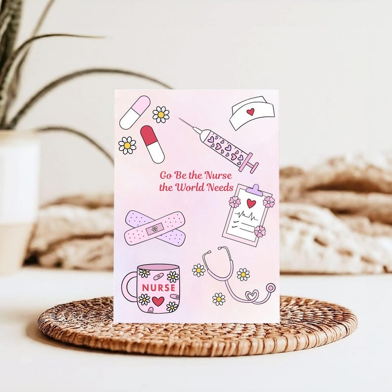 May include: A pink and white card with medical-themed illustrations, including a syringe, pills, bandages, a stethoscope, and a mug with the word "NURSE." The card also features the text "Go Be the Nurse the World Needs."