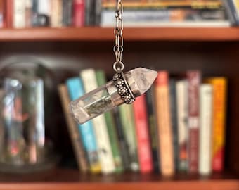 Vampire Reliquary—juniper, quartz crystal, moonstone, and sterling silver