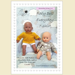 May include: Printable PDF sewing pattern for a baby doll t-shirt. The pattern is designed for 30cm baby dolls, such as Teeny Tiny Tears and Corolle dolls. The image shows two baby dolls wearing the t-shirt pattern.