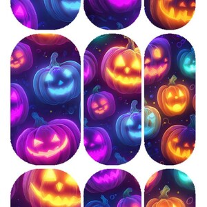 May include: A set of nail wraps featuring a repeating pattern of glowing jack-o'-lanterns in vibrant shades of orange, purple, and blue against a dark background. The top includes the text SEVENTY7 NAILS and WWW.SEVENTY7NAILS.COM.