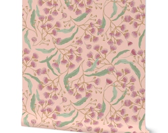 May include: A seamless pattern featuring pink flowers and green leaves on a light pink background. The floral design is perfect for wallpaper, fabric, or wrapping paper.