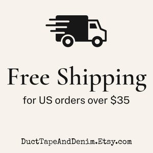 May include: A black graphic icon of a delivery truck positioned above the text Free Shipping for US orders over $35, followed by the website address DuctTapeAndDenim.Etsy.com, all displayed in black lettering on a light cream-colored background.