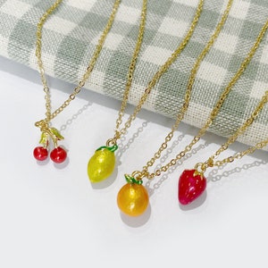 fruit necklace. choose from cherry, lemon, orange, or strawberry