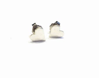 tiny hammered heart studs in silver earrings