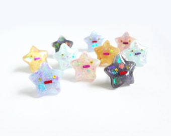 worried stars earrings, meh face stars, 5 colors to choose from blue, pink, grey, yellow, and mint